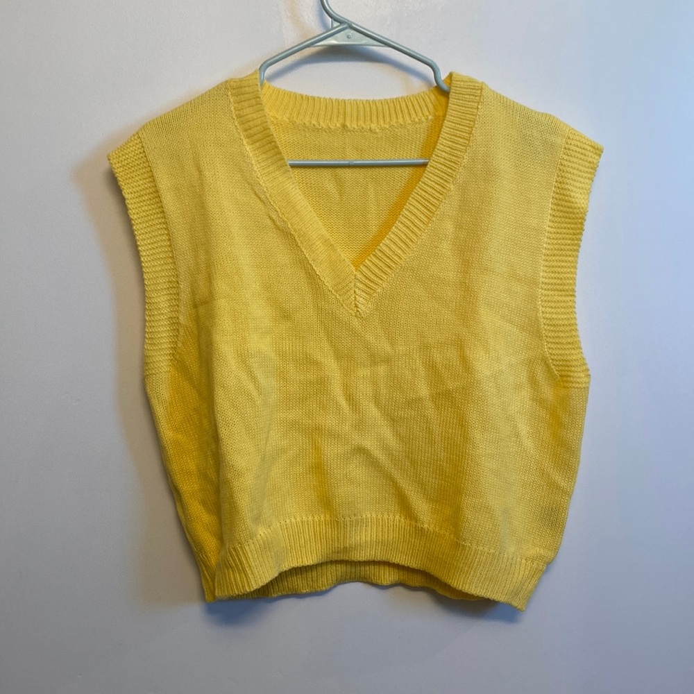 Yellow sweater vest